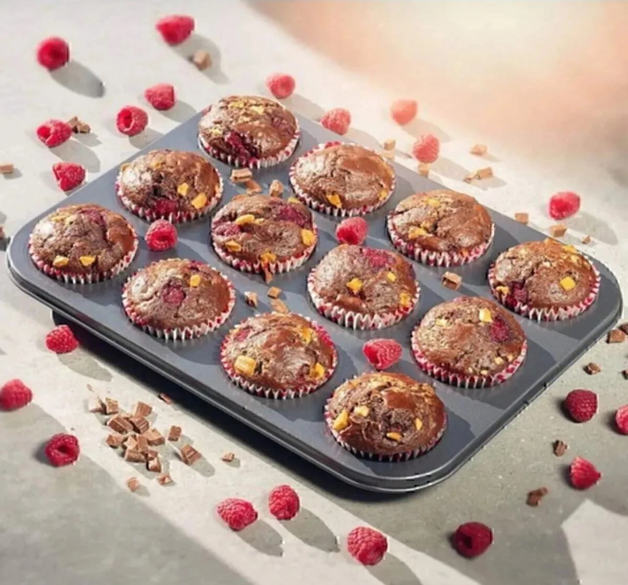 Moule à muffins antiadhésif 12 cavités.
